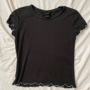 White ruffle edged top